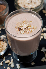 chocolate milkshake in a glass, top view closeup