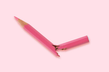 Broken pink colored pencil - Concept of violence against women