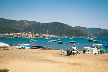 Fototapeta na wymiar View of the beach and sea bay with yachts