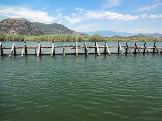 Vintage fish barriers on the river to regulate fish spawning