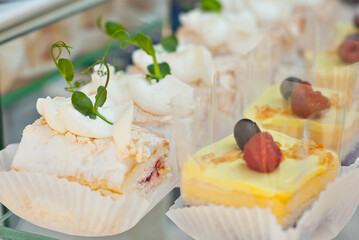Sweets on the table. Colorful cookies and pastries at the fair. Demonstration of local confectionery.