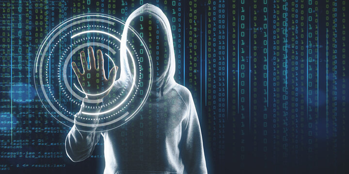 Hacker in hoodie standing on abstract binary code background with face recognition interface and mock up place. Hacking, ID and innovation concept. Double exposure.