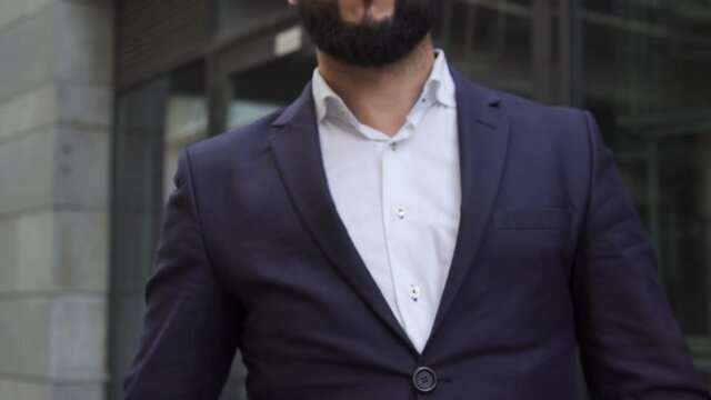 Man crumpling contract and throwing in out, dissatisfied with subcontractor work