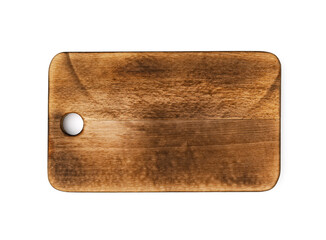 Dark wooden cutting board on white background