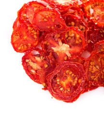 dried tomatoes on wooden background, top view