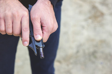 The man loads the gun. Self-defense and assault.