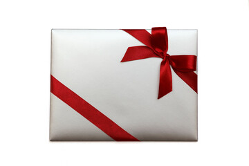 Christmas gift envelope with a red bow on a white background