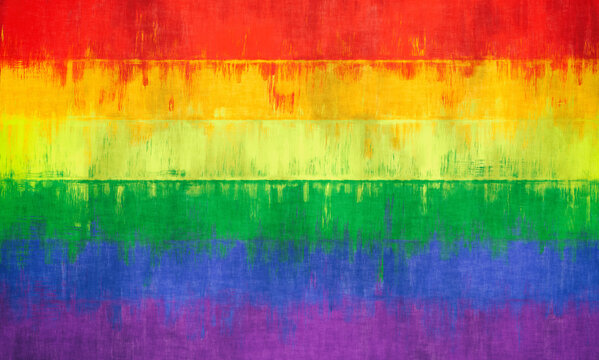 Pride LGBT rainbow color flag painted on a stone wall background