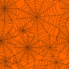 Traditional Halloween spider web seamless pattern.  Black hand-drawn cobwebs crossing on orange background. Repeating vector backdrop for textile, clothes, bedding, wrapping paper, wallpaper. - 464001998