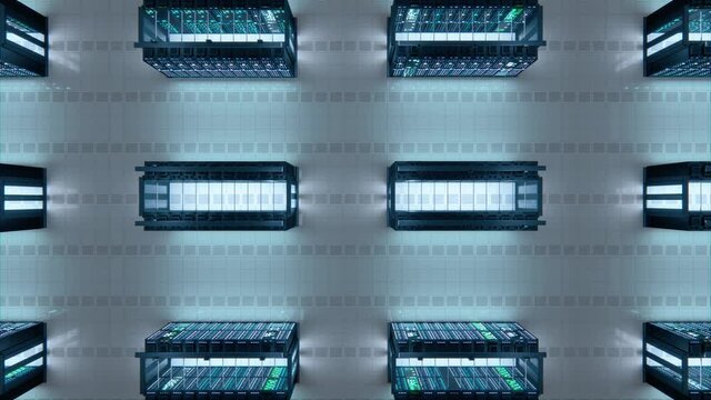 Modern Data Technology Center Server Racks Working in Well-Lighted Facility. Concept of Internet of Things, Big Data Protection, Storage, Cryptocurrency Farm, Cloud Computing. 3D Top Down Camera Shot.