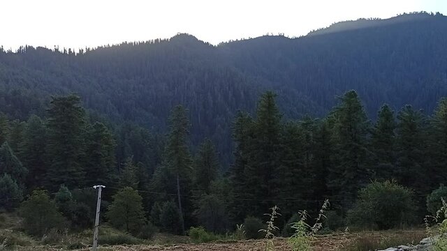 Beautiful view of Shogran (Siri paye), situated on a green plateau in the Kaghan Valley, northern Pakistan.