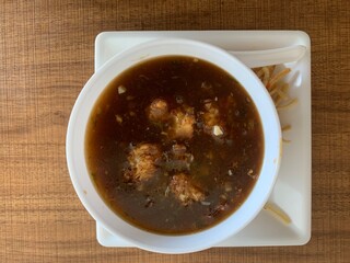 Manchow soup, indo chinese dish with manchurian balls. 