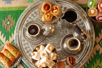Fototapeta na wymiar Turkish Coffee served with Turkish Delight on metal tray