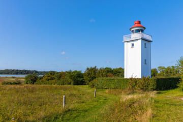 Knudshoved fyr, the lighthouse at Nyborg, Funen, Denmark - obrazy, fototapety, plakaty