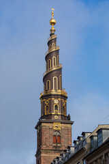 Fototapeta na wymiar Famous spiral spire of Vor Frelsers Kirke at Copenhagen, Denmark