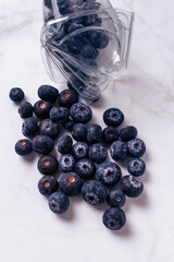 High angle view of sweet blueberries isolated on white background with copy space. Fresh fruit with white background easy to remove. 
