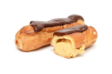 сhocolate eclairs isolated on white