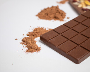 chocolate pieces on white background