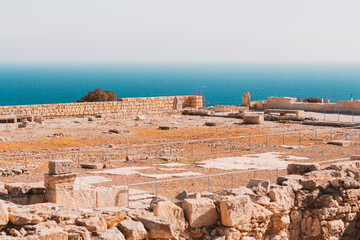 Ancient ruins of old town in archaeological site Kourion, Cyprus.