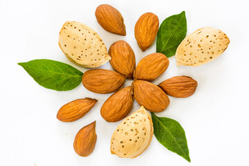 Almond kernels and nuts on a white background isolated