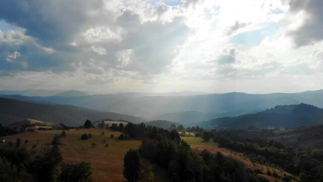 Aerial View of Green Hills of Pester Plateau, Mountain Region in Western Serbia on Summer Day, Drone Shot
