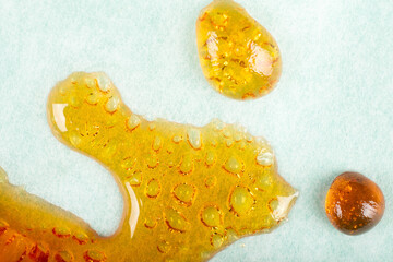 high thc, drop of yellow cannabis wax, marijuana medical concentrate
