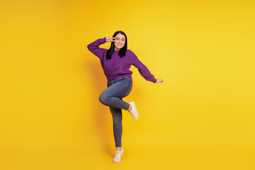 Fototapeta na wymiar Full length body size view of nice playful girl having fun fooling show peace cool v-sign isolated on yellow color background