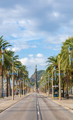 Paseo de Colon in the city of Barcelona with the famous statue of the discoverer in the background