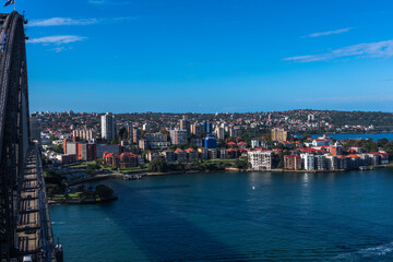 Fototapeta premium Pylon lookout - Overlooking the Sydney Harbour Bridge and McMahon's Point on a beautiful sunny day - April 2019