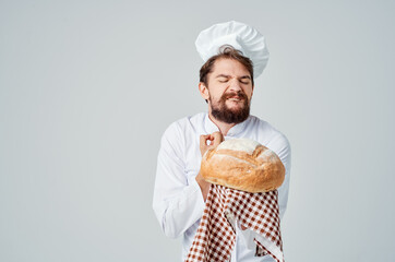 male cook with bread in hand culinary industry