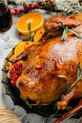 Festive Christmas duck baked with orange, rosemary and berry. Christmas festive table. top view