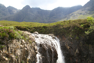 landscape of the fairy falls on the isle of skye