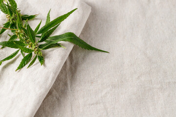 Creased light beige grey color natural fabric from hemp plant  as background with copy space.