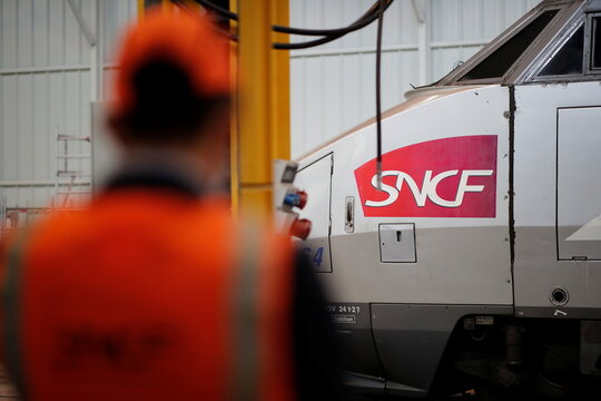 Refit and maintenance work on a passenger train used on the TGV Atlantique line of the SNCF network at the Technicentre workshop in Rennes