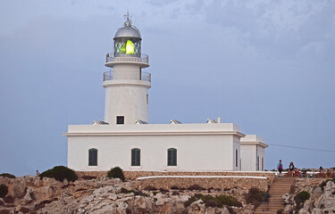 Fototapeta na wymiar Faro de Punta Nati en Menorca Islas Baleares España