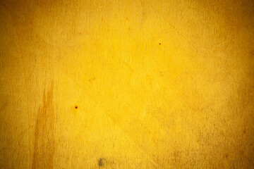 Yellow wooden board background.