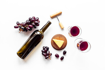Fototapeta premium Set of wine bottle with glasses corkscrew and grape
