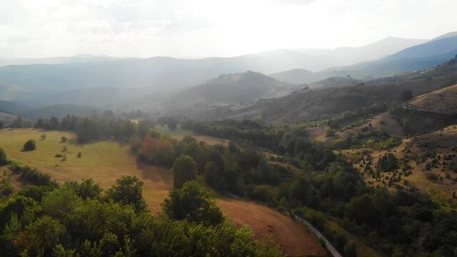 Aerial View of Green Hills of Pester Plateau, Mountain Region in Western Serbia on Summer Day, Drone Shot