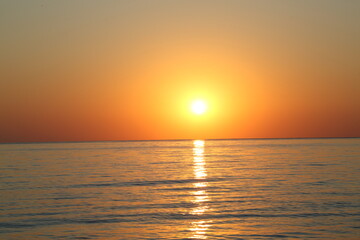 sunrise over a perfect calm mediterranean sea