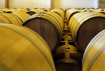 Stacked casks at a whisky distillery