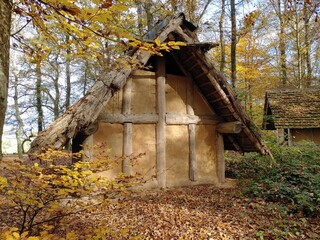 Reconstructed Celtic village (Keltendorf) on Druidenpfad hiking trail in autumn forest near the...