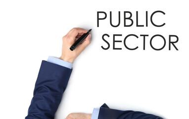 Man writing phrase PUBLIC SECTOR on white background, top view