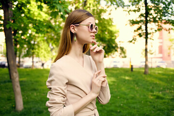 beautiful woman walk in the park this summer model