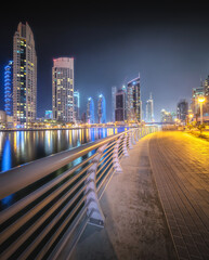 Night time panoramic view of Dubai Marina bay and city center, UAE