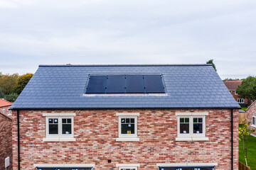 New build homes with built in rooftop solar panels - obrazy, fototapety, plakaty