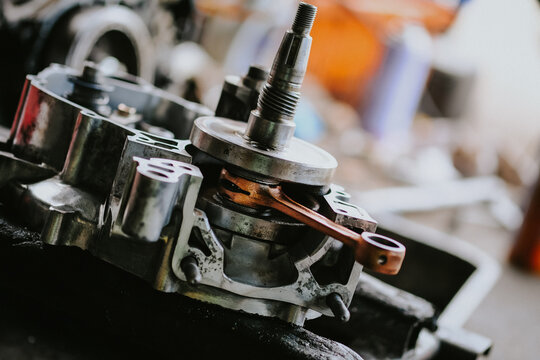 Close-up of the new engine connecting rod of a motorcycle.