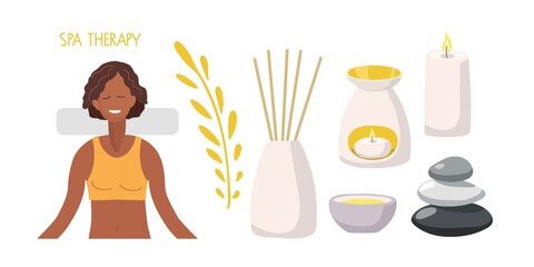 Spa therapy. Young African American woman enjoys relaxation. Hot stones, candles, oil bowl, aroma diffuser In fashionable modern style in pastel tones. Beauty spa treatment and relax concept