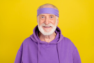 Photo of mature man pensioner good mood wear sportive outfit cool isolated over yellow color background