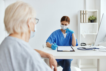 Fototapeta premium nurse and patient examination health care