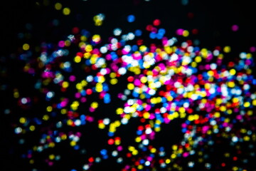 Fototapeta na wymiar glittering shine bulbs lights background. abstract blurred of bl